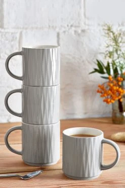 Next Set Of 4 Grey Embossed Stacking Mugs